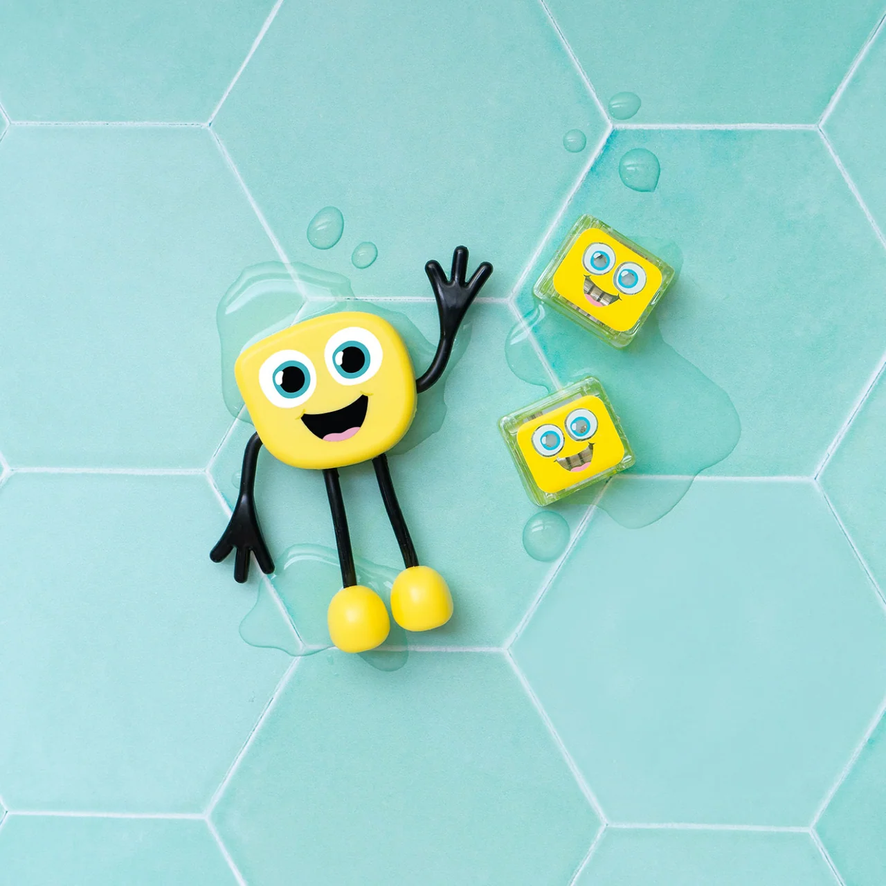 Glo Pals – Personnage lumineux pour le bain avec 2 cubes – Alex - Jaune